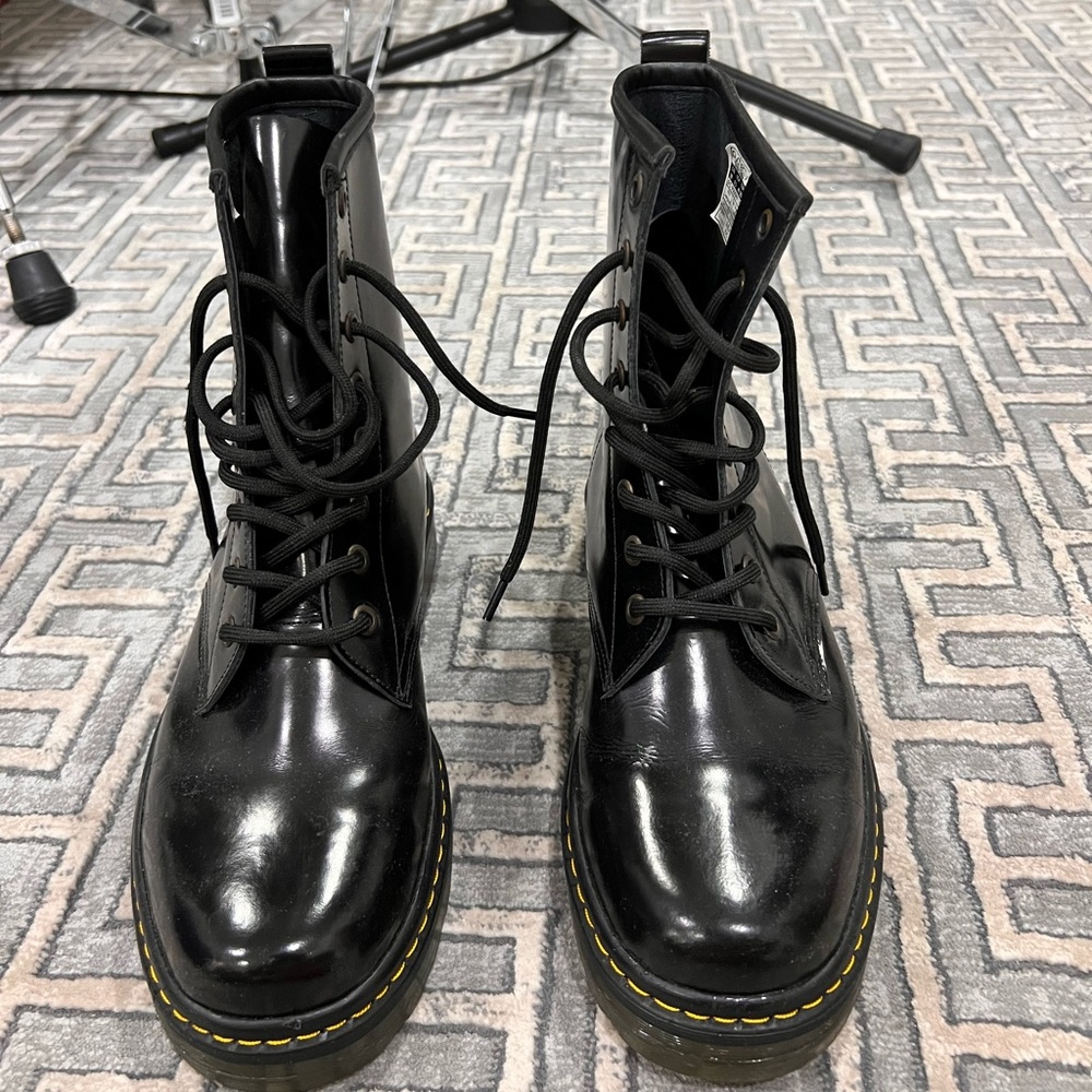 Glossy black combat boots